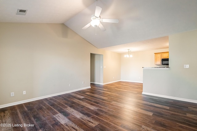 10202 Deer Vista Dr Unit 202, Louisville, KY 40291 - unfurnished living room with a chandelier, ceiling fan, dark wood-type flooring, lofted ceiling, and baseboards