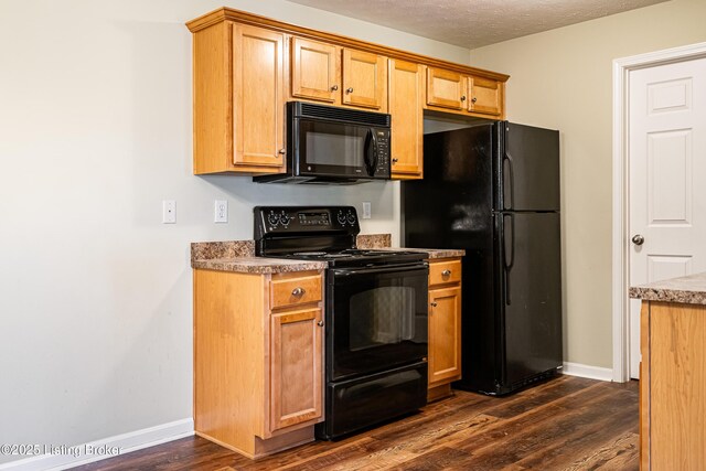 10202 Deer Vista Dr Unit 202, Louisville, KY 40291 - kitchen with black appliances, dark wood-style floors, baseboards, and a textured ceiling