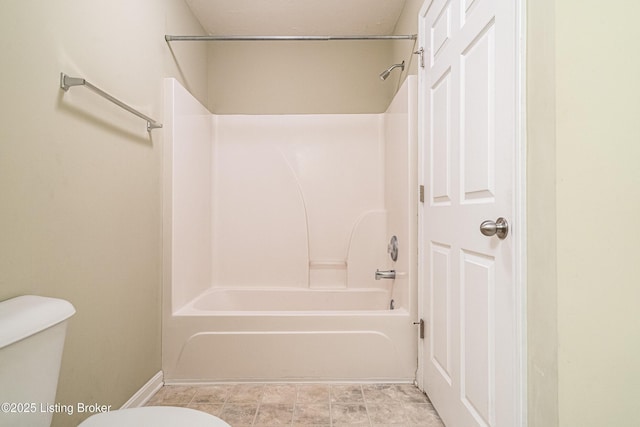 10202 Deer Vista Dr Unit 202, Louisville, KY 40291 - bathroom featuring toilet, shower / bath combination, and baseboards