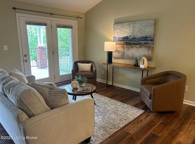 10202 Deer Vista Dr Unit 202, Louisville, KY 40291 - living area with wood finished floors, baseboards, and lofted ceiling