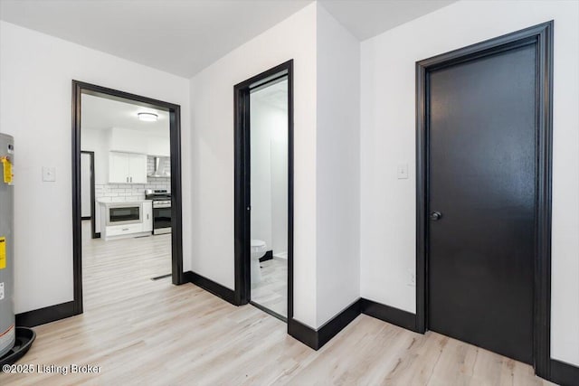 2209 Shelby St, New Albany, IN 47150 - hall with light wood-style flooring and baseboards