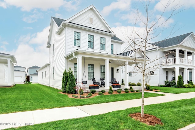 view of front facade featuring a front lawn and covered porch