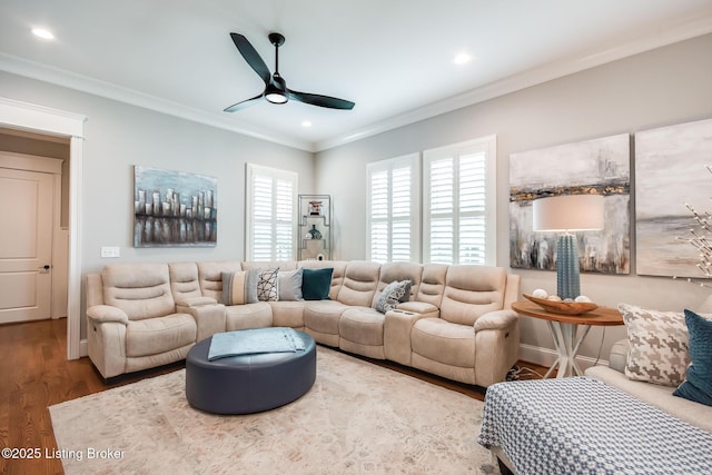 living room with recessed lighting, wood finished floors, a ceiling fan, and ornamental molding