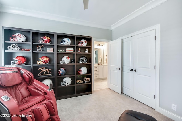 living area featuring light carpet, ornamental molding, and baseboards