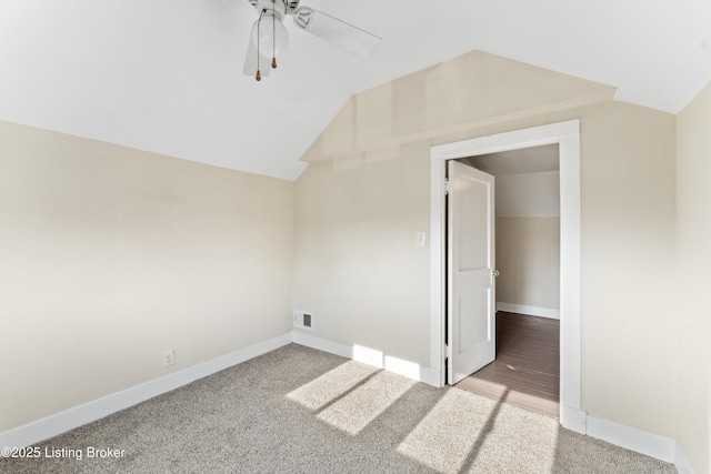 bonus room featuring vaulted ceiling, visible vents, a ceiling fan, carpet floors, and baseboards