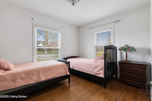 109 Ridgeway Ave, Louisville, KY 40207 - bedroom with dark wood-style flooring and multiple windows