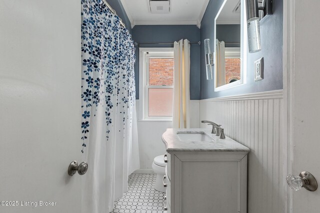 109 Ridgeway Ave, Louisville, KY 40207 - full bathroom with toilet, vanity, a wainscoted wall, crown molding, and a shower with shower curtain