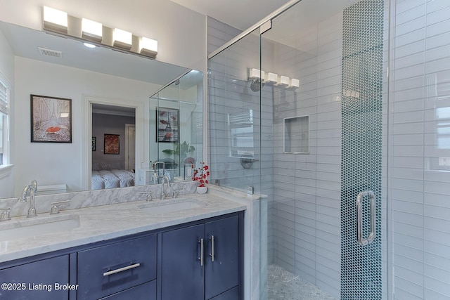 ensuite bathroom with ensuite bath, double vanity, visible vents, and a sink
