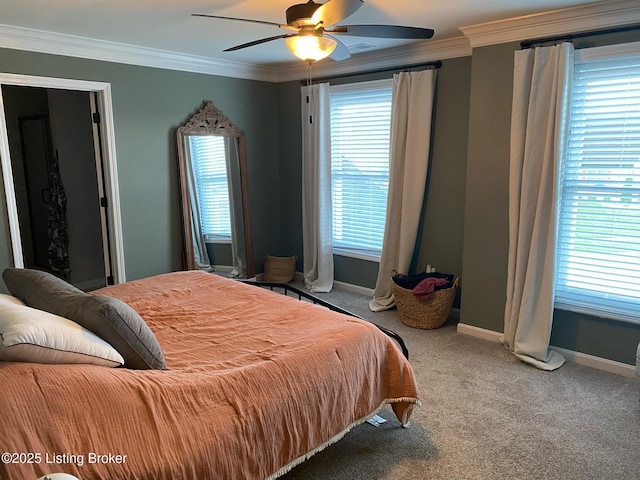 bedroom featuring a ceiling fan, carpet flooring, baseboards, and ornamental molding