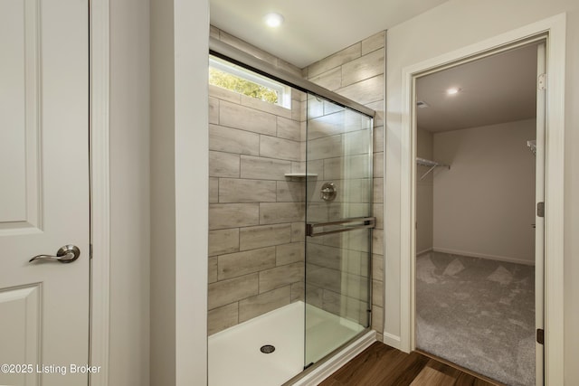 LOT209 Cobblestone Ln, La Grange, KY 40031 - full bath featuring a shower stall, a spacious closet, baseboards, and wood finished floors