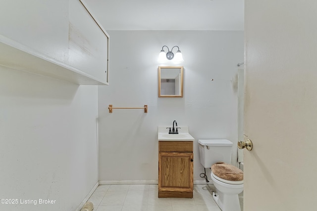 4311 Kurtz Ave, Louisville, KY 40229 - half bath featuring baseboards, toilet, vanity, and tile patterned floors