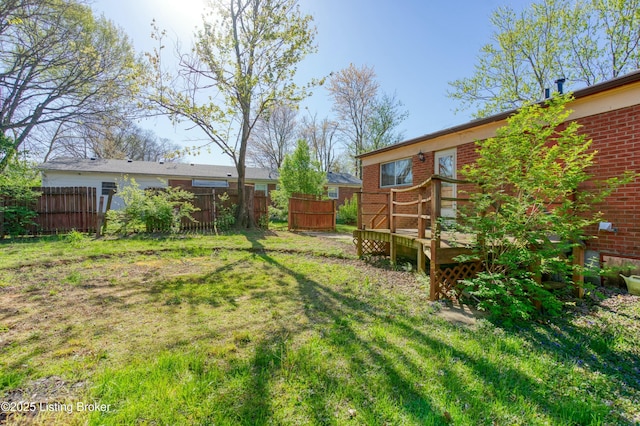 4311 Kurtz Ave, Louisville, KY 40229 - view of yard featuring a wooden deck and fence