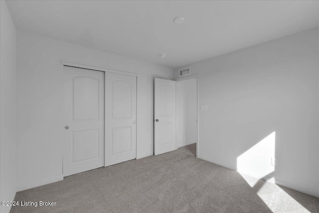 1848 Washington Blvd, Lyndon, KY 40242 - unfurnished bedroom featuring carpet and a closet