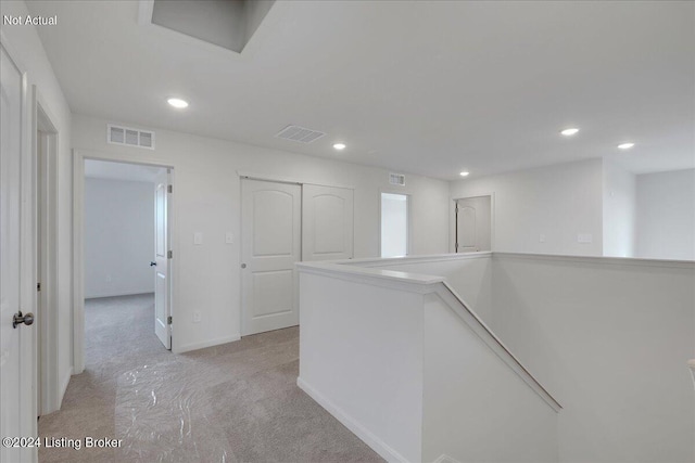 1848 Washington Blvd, Lyndon, KY 40242 - hall with an upstairs landing, light colored carpet, recessed lighting, and baseboards