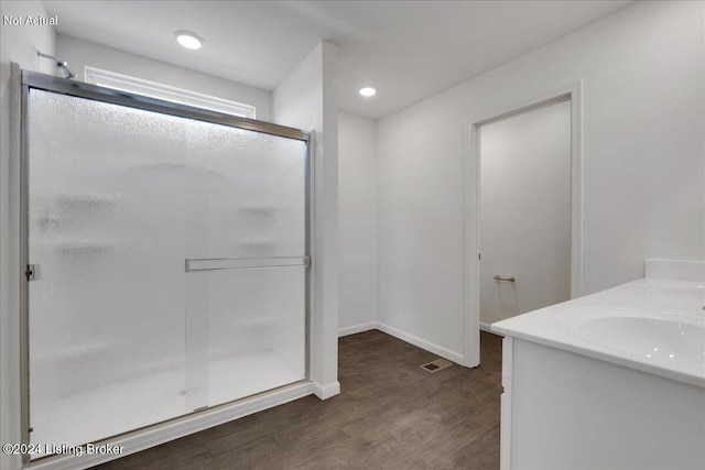 1848 Washington Blvd, Lyndon, KY 40242 - full bath featuring a shower stall, wood finished floors, baseboards, vanity, and recessed lighting
