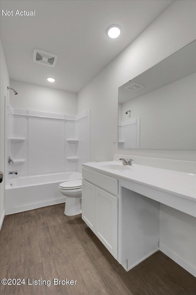 1848 Washington Blvd, Lyndon, KY 40242 - bathroom featuring vanity, wood finished floors, toilet, and tub / shower combination