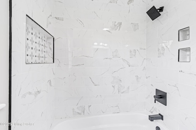 full bath featuring bathing tub / shower combination