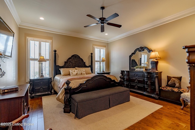 bedroom with recessed lighting, dark wood-type flooring, ceiling fan, and crown molding