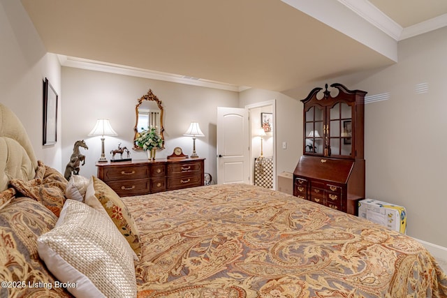 bedroom with baseboards, carpet, and crown molding