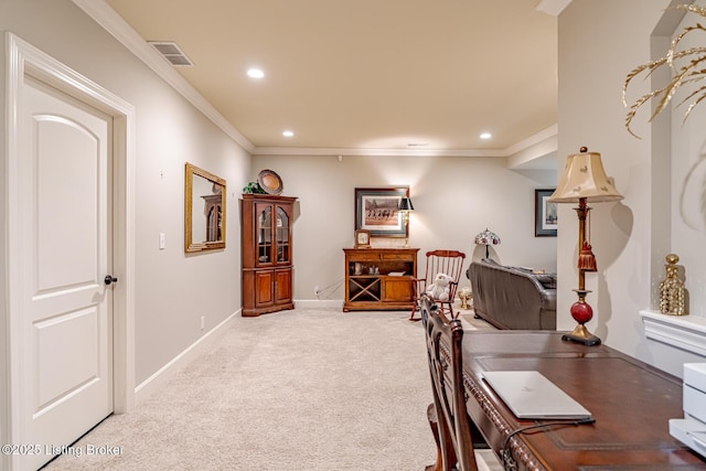 office featuring recessed lighting, ornamental molding, visible vents, and carpet