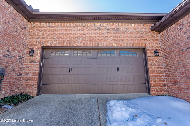 garage with concrete driveway