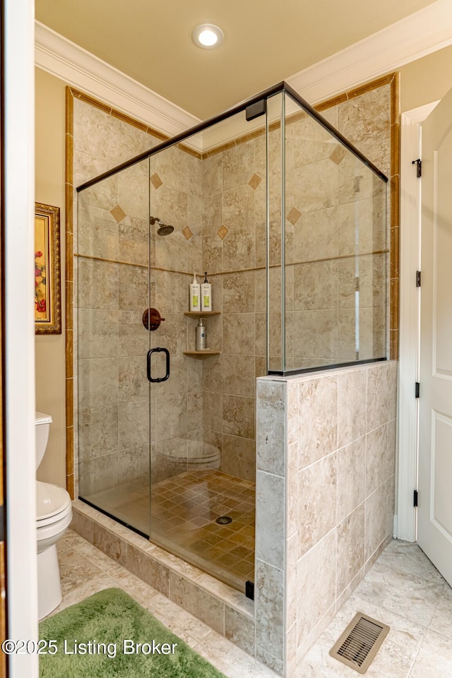 full bath with toilet, visible vents, recessed lighting, a shower stall, and ornamental molding