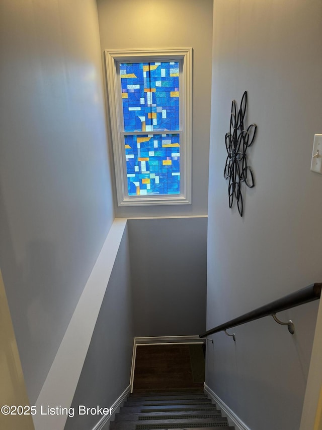 staircase with baseboards