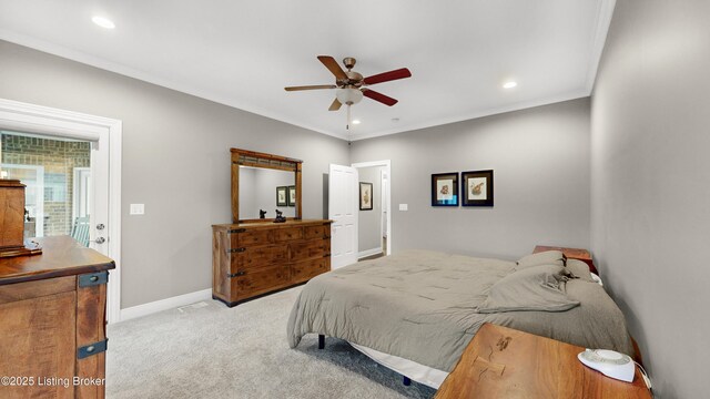 bedroom featuring baseboards, recessed lighting, crown molding, and carpet flooring