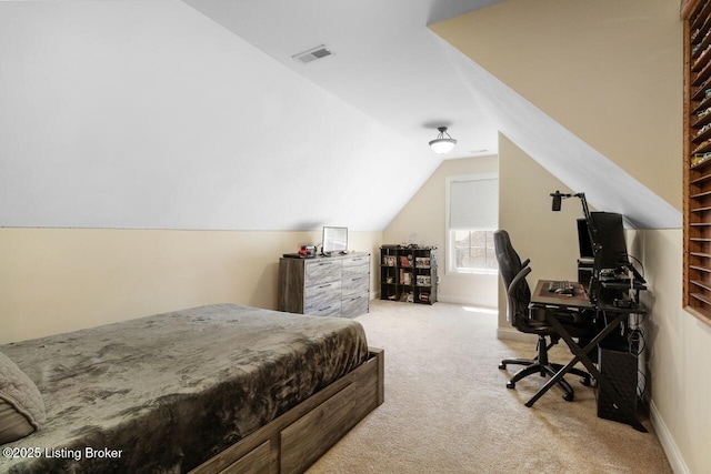 bedroom featuring vaulted ceiling, carpet, baseboards, and visible vents