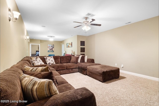 living area featuring a ceiling fan, baseboards, visible vents, and carpet floors