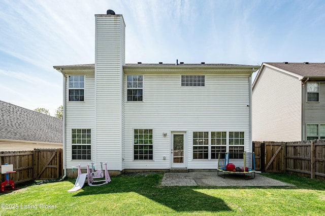 8805 Eli Dr, Louisville, KY 40291 - back of house featuring a gate, a yard, a patio area, and a fenced backyard