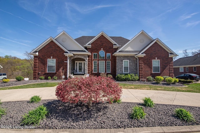 view of front facade featuring brick siding