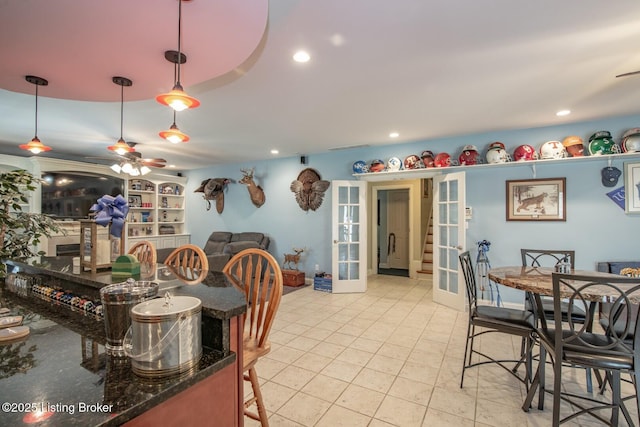 dining area with recessed lighting, a ceiling fan, light tile patterned floors, and french doors