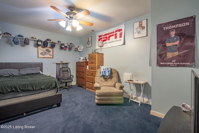 carpeted bedroom with baseboards, a ceiling fan, and visible vents