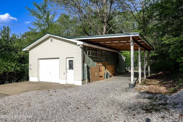 garage featuring a garage and driveway