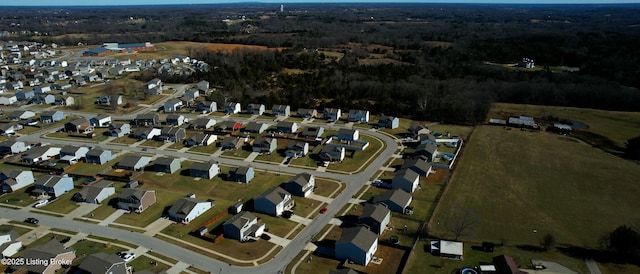aerial view with a wooded view