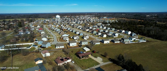 birds eye view of property with a residential view