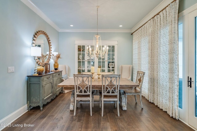 dining area with recessed lighting, ornamental molding, dark wood-style flooring, baseboards, and a notable chandelier