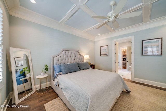 bedroom featuring wood finished floors, recessed lighting, coffered ceiling, and crown molding