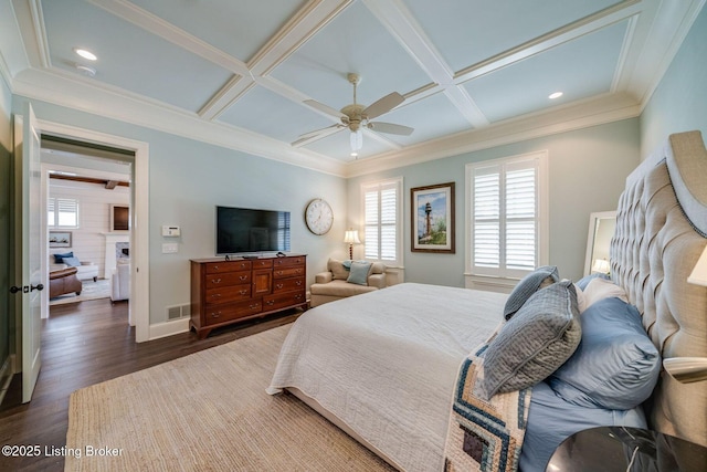 bedroom with ornamental molding, coffered ceiling, dark wood-style flooring, and multiple windows