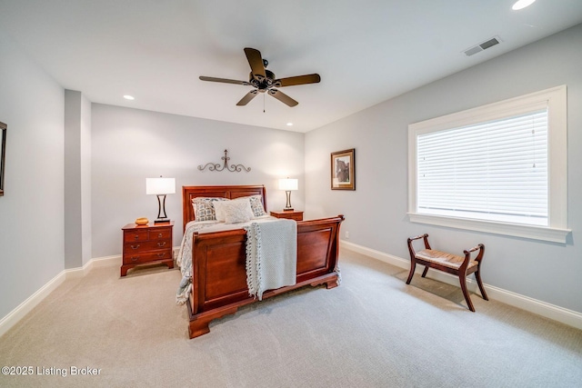 bedroom featuring light carpet, baseboards, visible vents, and recessed lighting