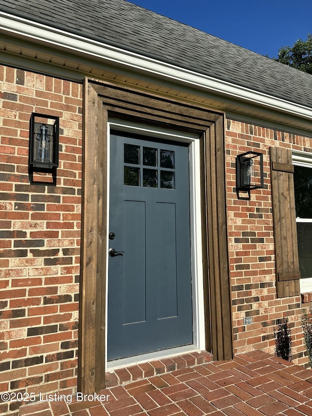 9004 Old Bardstown Rd Rd, Louisville, KY 40291 - property entrance featuring roof with shingles and brick siding