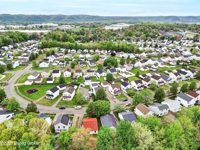 aerial view featuring a mountain view and a residential view