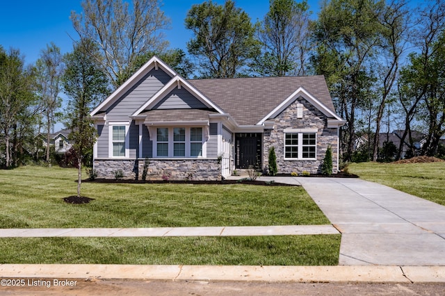 10535 Vista View Dr, Louisville, KY 40291 - craftsman inspired home featuring stone siding, a front yard, and concrete driveway