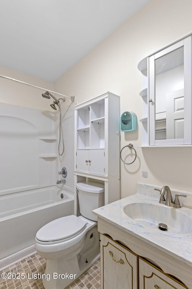 full bath with toilet, vanity, and shower / washtub combination