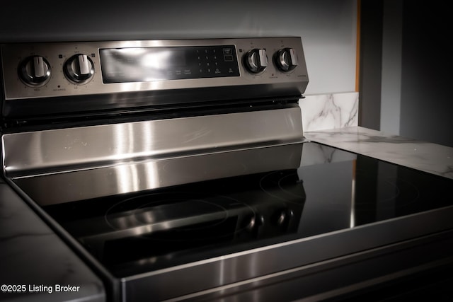 interior details featuring stainless steel electric range