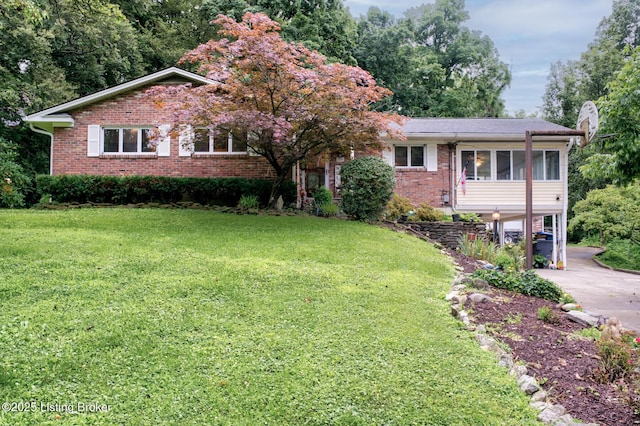 7105 Woodrow Way, Louisville, KY 40228 - ranch-style home with a sunroom, brick siding, and a front yard