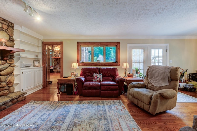 7105 Woodrow Way, Louisville, KY 40228 - living room featuring a textured ceiling, wood finished floors, ornamental molding, and a fireplace