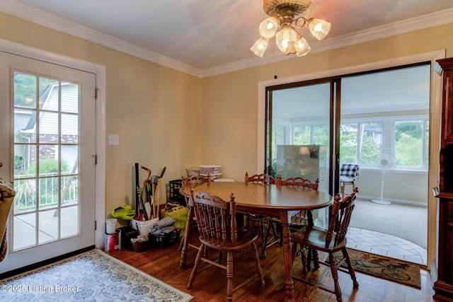 7105 Woodrow Way, Louisville, KY 40228 - dining room with plenty of natural light, ornamental molding, wood finished floors, and ceiling fan