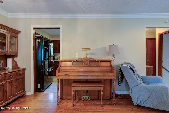 7105 Woodrow Way, Louisville, KY 40228 - living area featuring light wood-style floors, a textured ceiling, and crown molding